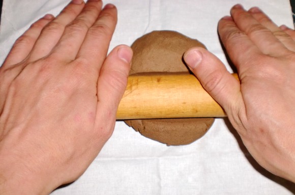 Roll clay with a rolling pin