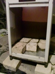 How to make a homemade electric pottery kiln. Lay the bottom of the kiln